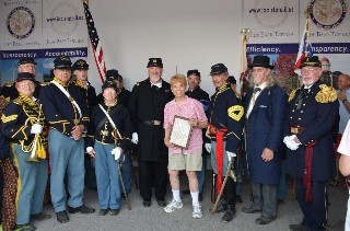 Regiment with Comptroller Topinka with Plaque
